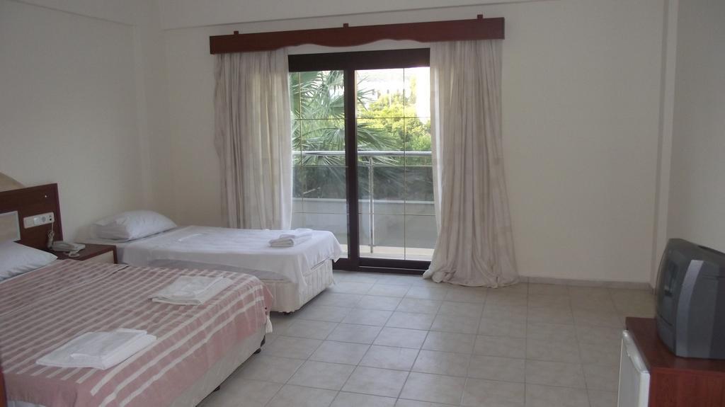 Ado Beach Hotel Тургутрейс Стая снимка